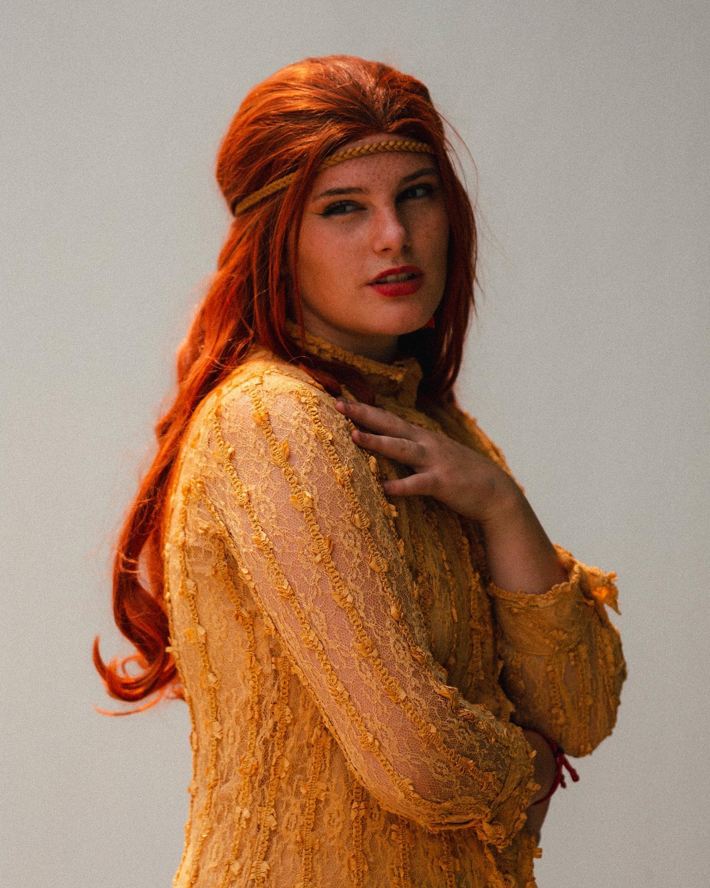 Studio portrait in amber light