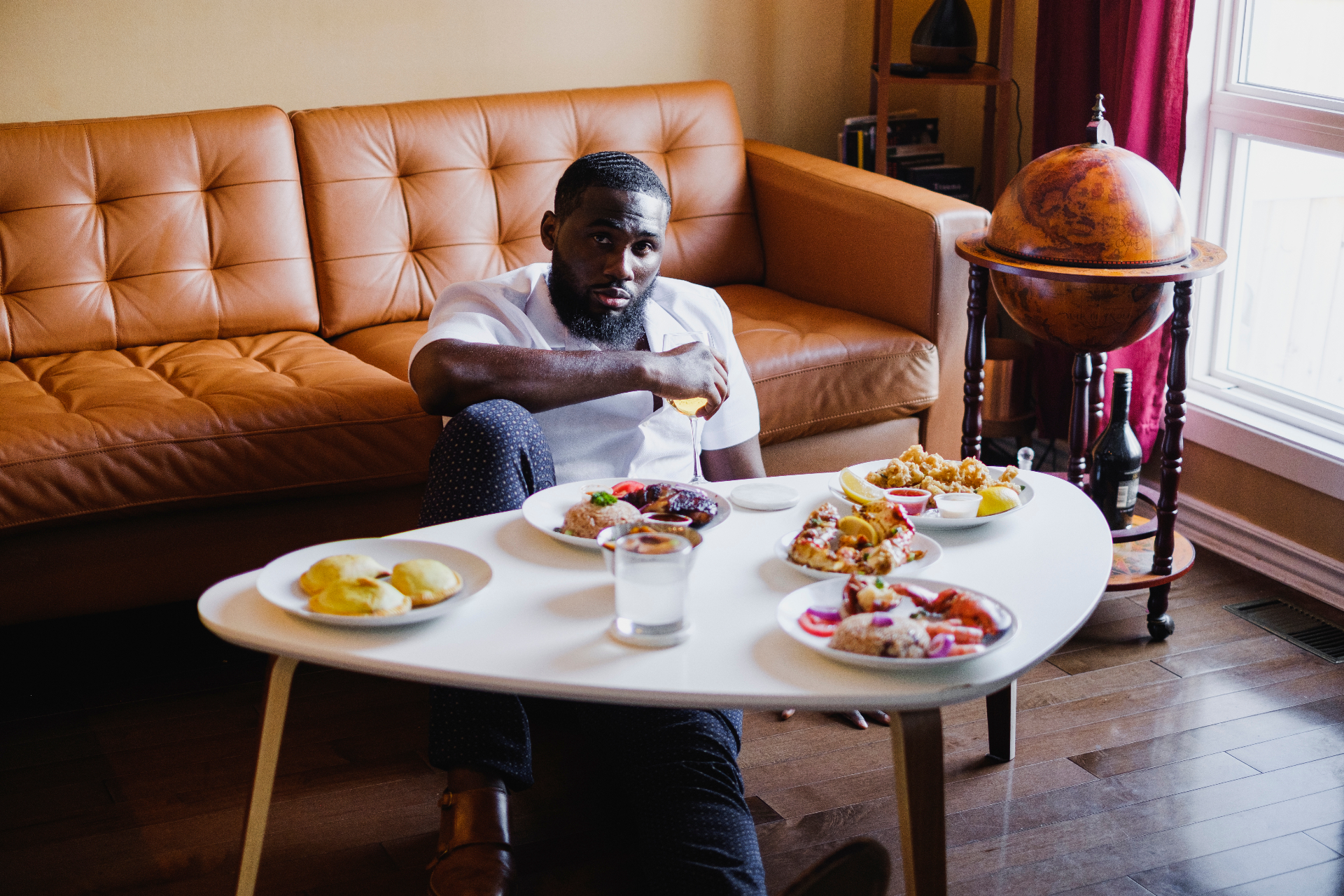 Editorial portrait with a styled dinner spread