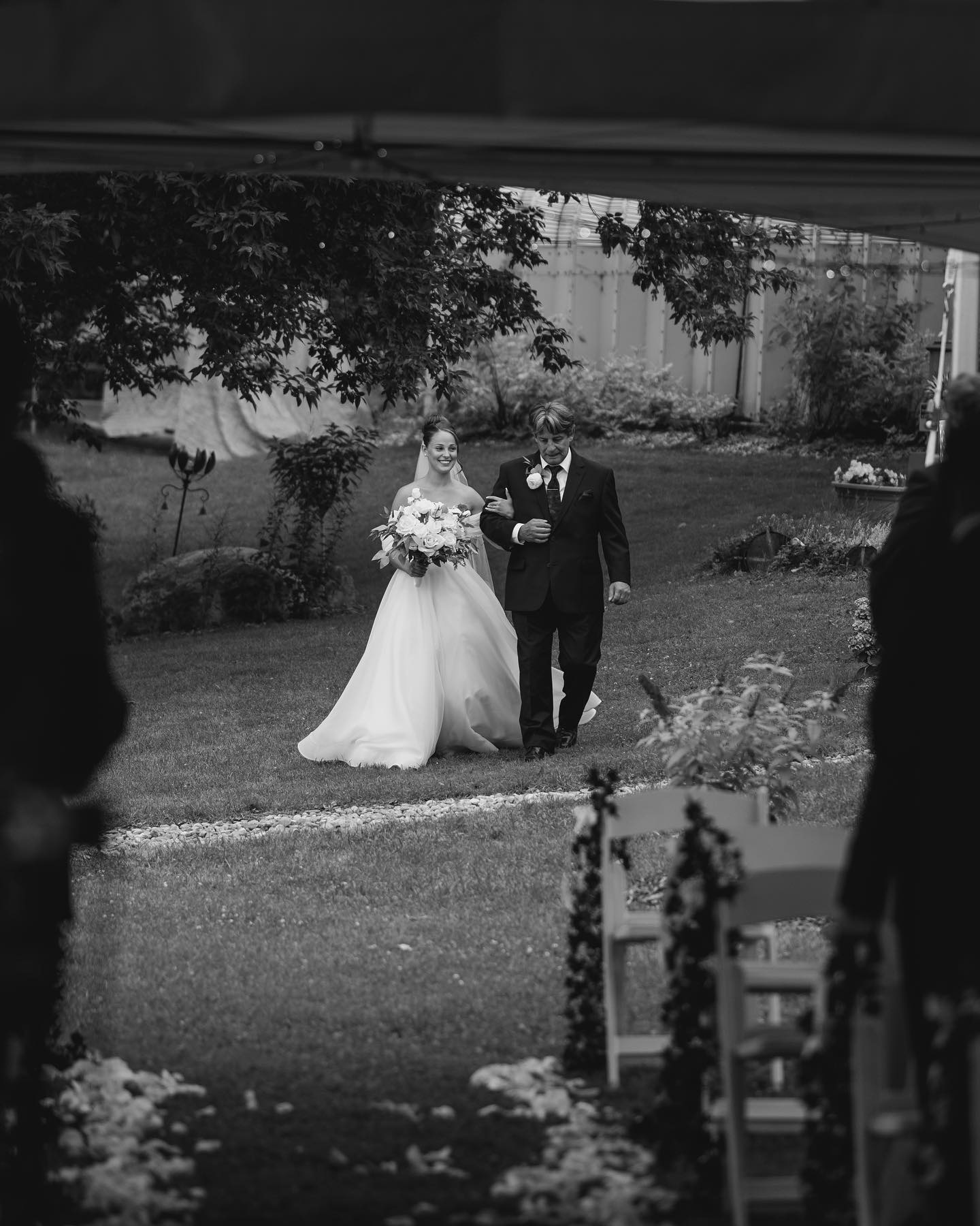 Bride walking down the aisle with her father