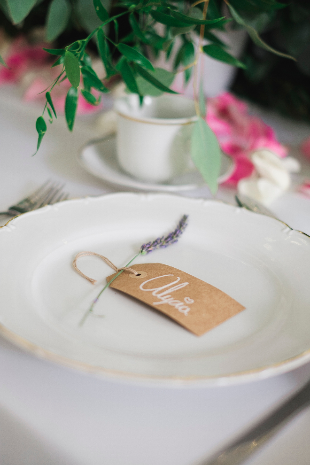 Reception place setting with kraft name tag and lavender sprig